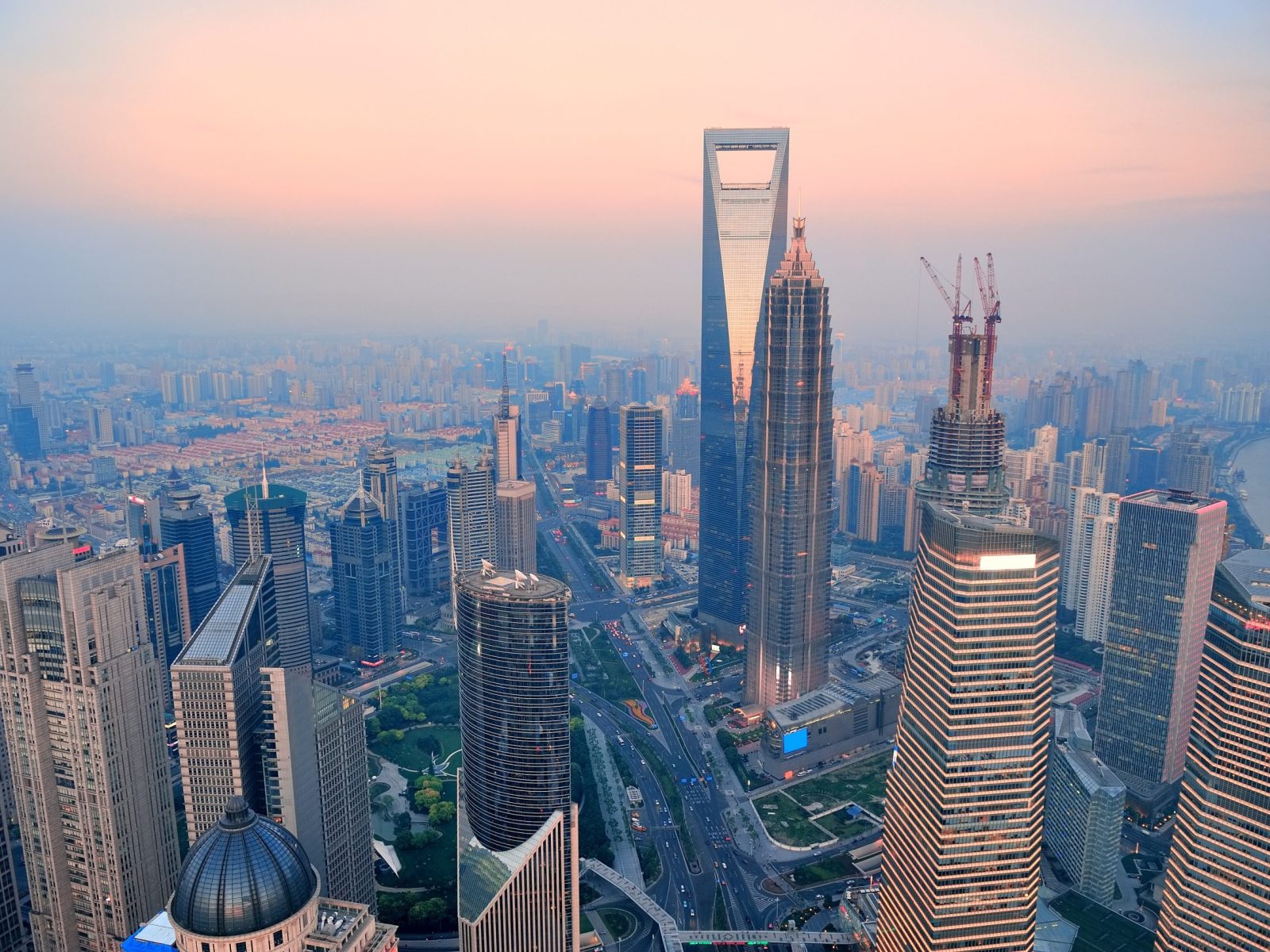 Shanghai aerial view with urban architecture and sunset